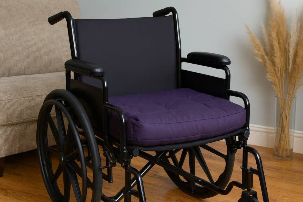 black wheelchair with blue cushion