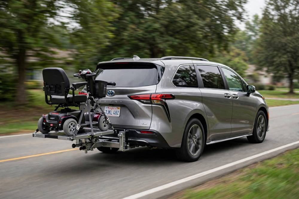 minivan carrying scooter on rear lift