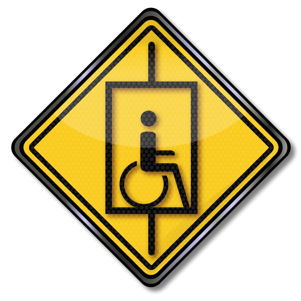 wheelchair user yellow sign